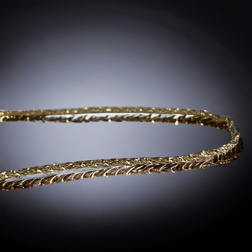 388 - A long 18ct Gold rope twist chain.
80cm Long
Weight - 11g