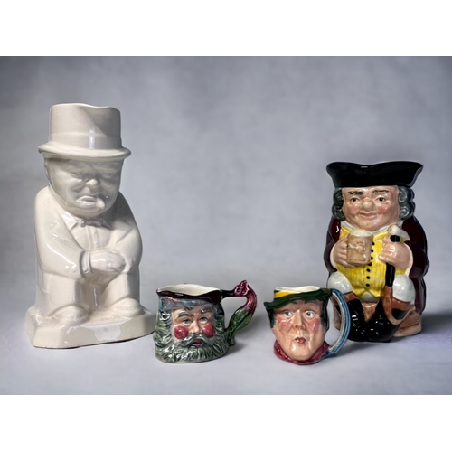 328 - A Collection of Toby Jugs.
Including a Spode 'Churchill' in white. Design by Eric Olsen. Together wi... 