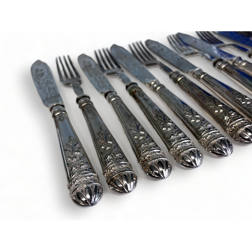 329 - A Set of 19th Century Silver Plate Knives & Forks.
By Elkington & co. With Diamond registration mark... 