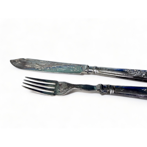 329 - A Set of 19th Century Silver Plate Knives & Forks.
By Elkington & co. With Diamond registration mark... 