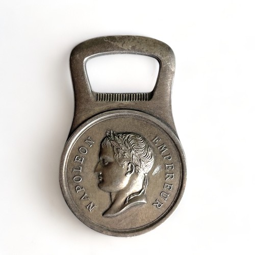 335 - A Christofle, France silver plate bottle opener. 
Depicting a profile of Napoleon.
Length - 8cm