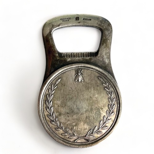 335 - A Christofle, France silver plate bottle opener. 
Depicting a profile of Napoleon.
Length - 8cm