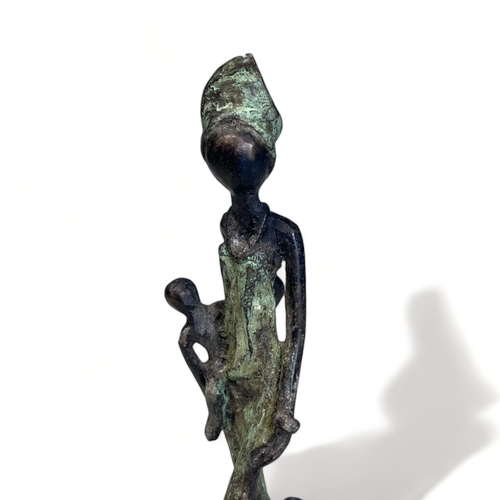 339 - An African bronze figure.
20th Century
Depicting a mother with two kids. 
Height - 16.5cm