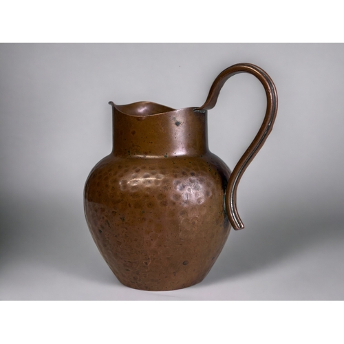 345 - A Pair of Arts & Crafts Style Copper Milk Jugs. 
Marked to base.