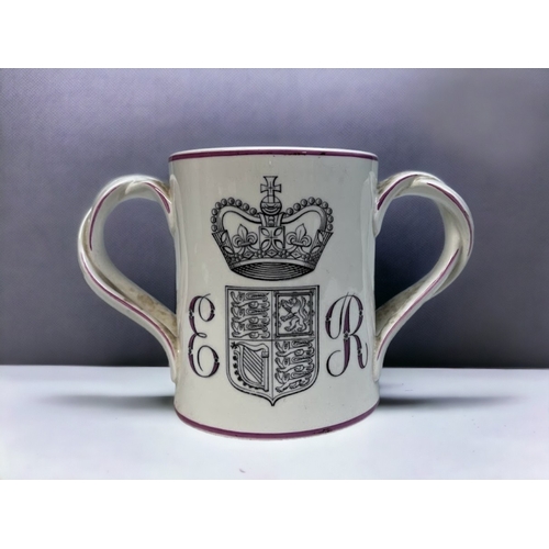 347 - A Royal Doulton 1953 Loving Cup.
Queen Elizabeth II Coronation, designed by Milner Gray.
14.5 x 23 c... 