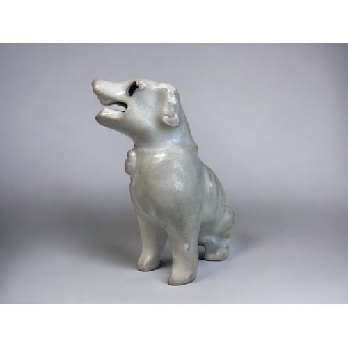 16 - A PAIR OF CHINESE DEHUA PORCELAIN DOGS.
Qing dynasty, Kangxi period (1662-1722)
Modelled as seated d... 