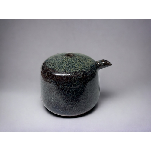 158 - A JAPNESE GLAZED POTTERY SUITEKI WATER DROPPER.
Koishiwara ware glaze.
Impressed mark to base. 
6 x ... 