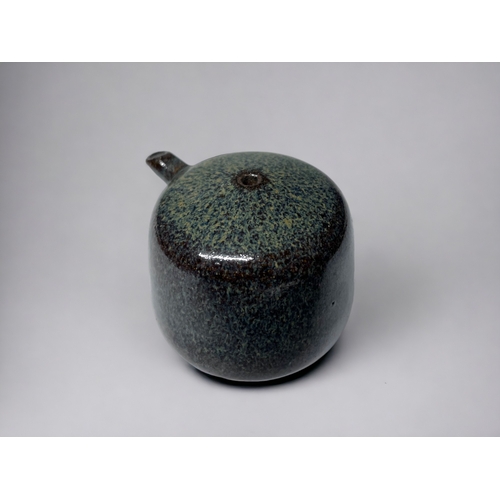 158 - A JAPNESE GLAZED POTTERY SUITEKI WATER DROPPER.
Koishiwara ware glaze.
Impressed mark to base. 
6 x ... 