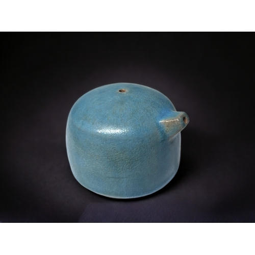 159 - A JAPANESE POTTERY SUITEKI WATER DROPPER.
Late Meiji period. 
Turquoise glazed. 
6.5 x 7.5cm