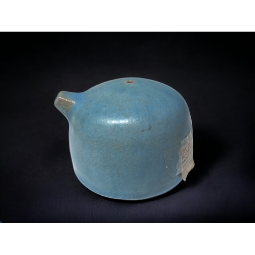 159 - A JAPANESE POTTERY SUITEKI WATER DROPPER.
Late Meiji period. 
Turquoise glazed. 
6.5 x 7.5cm