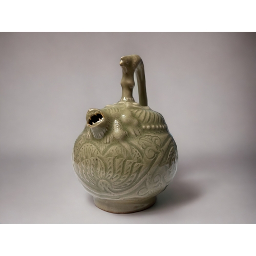 160 - A CHINESE YAOZHOU CELADON POT.
Celadon glazed. 
Cadogan for so called 'mystery teapot'. In the North... 