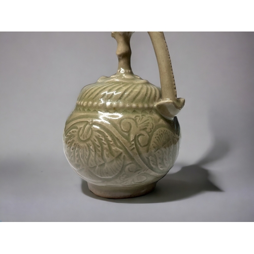 160 - A CHINESE YAOZHOU CELADON POT.
Celadon glazed. 
Cadogan for so called 'mystery teapot'. In the North... 