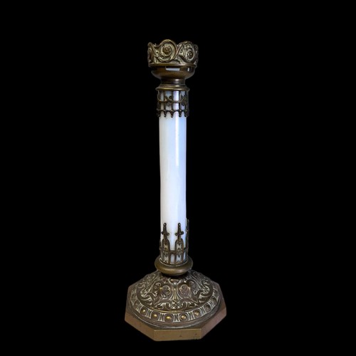 284 - AN UNUSUAL BRASS & GLASS ALTAR CANDLESTICK.
French, Circa 1900.
With a white iridescent glass column... 