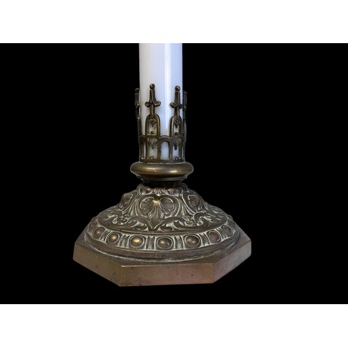 284 - AN UNUSUAL BRASS & GLASS ALTAR CANDLESTICK.
French, Circa 1900.
With a white iridescent glass column... 