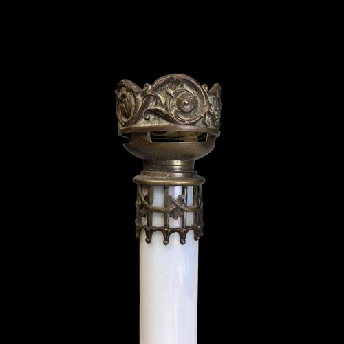 284 - AN UNUSUAL BRASS & GLASS ALTAR CANDLESTICK.
French, Circa 1900.
With a white iridescent glass column... 