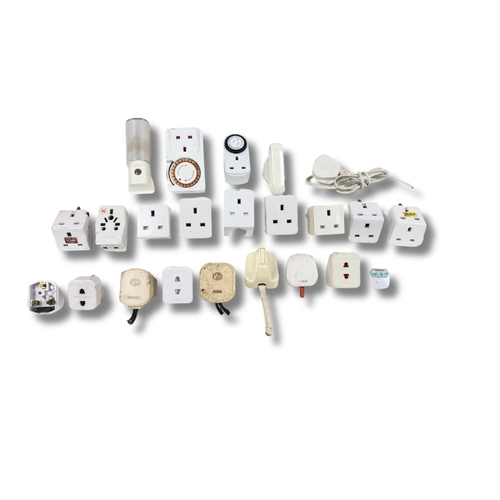 240 - Assortment of Plugs, Adapters, Timing Switches & Night Light.