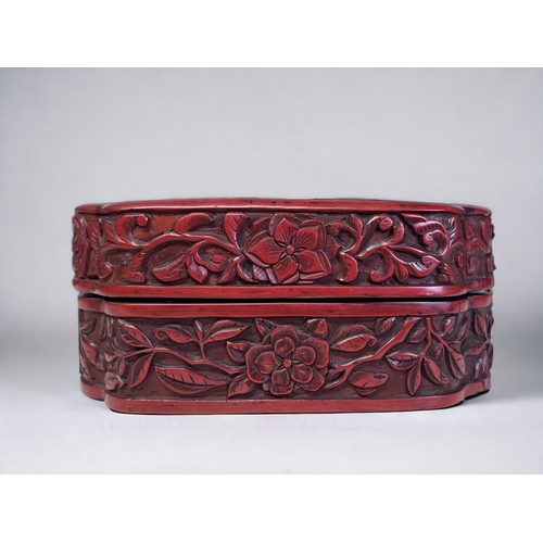 24 - A DEEPLY CARVED CHINESE CINNABAR BOX.
18th/19th Century.
Carved, unusual with an Immortal of Dragon ... 