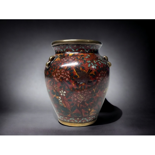 37 - A FINE QUALITY JAPANESE CLOISONNE VASE.
Meiji period (1868-1912).
Unusual modelled in a Martaban sty... 