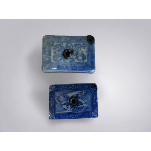 162 - TWO JAPANESE PORCELAIN WATER DROPPERS.
Both rectangular form, one decorated with Lingzhi & lotus des... 