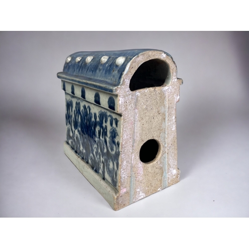 33 - A SCARCE CHINESE PORCELAIN BUILDING BLOCK RIDGE TILE. 
Qing dynasty. 
Blue & white painted foliate d... 