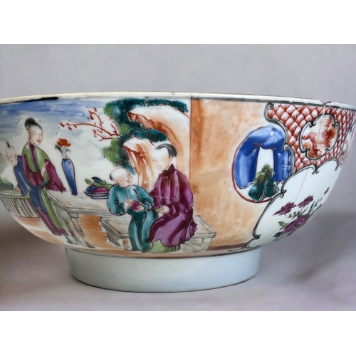 49 - A CHINESE EXPORT PORCELAIN PUNCH BOWL. 
Qianlong period. 
Hand painted enamels scenes in Famille ros... 