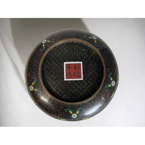 44 - A CHINESE CLOISONNE BOWL.
Early 20th century.
Intricately decorated with stylised foliate designs, a... 