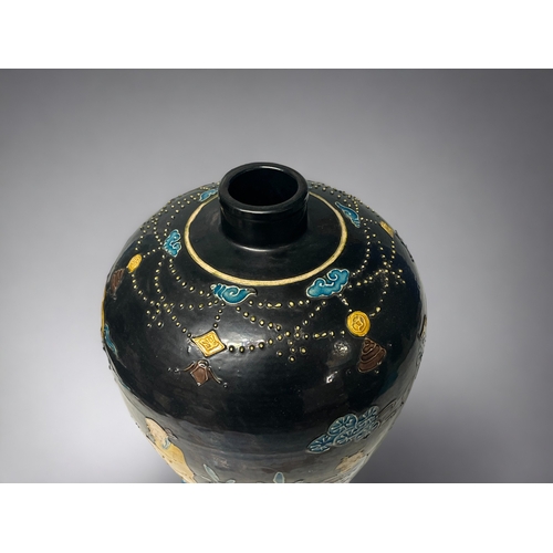 76 - A large Chinese Northen Fahua decorated Meiping vase. Slip decorated with blue & yellow enamels.... 