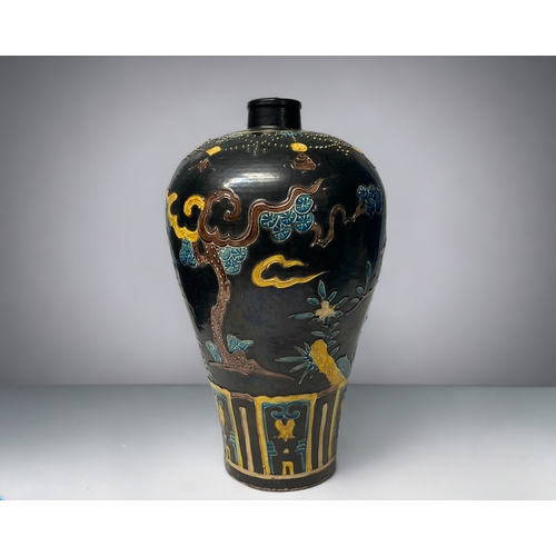 76 - A large Chinese Northen Fahua decorated Meiping vase. Slip decorated with blue & yellow enamels.... 