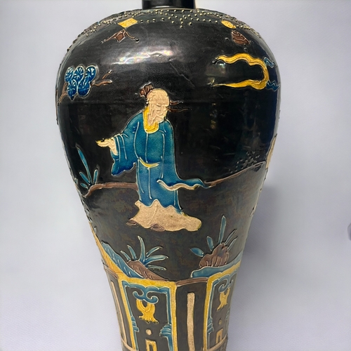 76 - A large Chinese Northen Fahua decorated Meiping vase. Slip decorated with blue & yellow enamels.... 