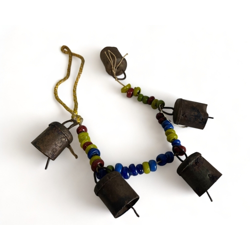 5 - ANTIQUE TIBETAN / INDIAN BEADED COW BELLS.
Strung with metal bells and multicoloured beads.