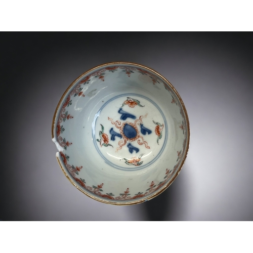 84 - A CHINESE PORCELAIN 'AMSTERDAM BONT' BOWL.
Kangxi period.
Blue painted Qilong Dragons, with later Du... 