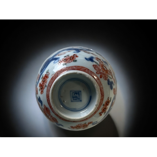 84 - A CHINESE PORCELAIN 'AMSTERDAM BONT' BOWL.
Kangxi period.
Blue painted Qilong Dragons, with later Du... 