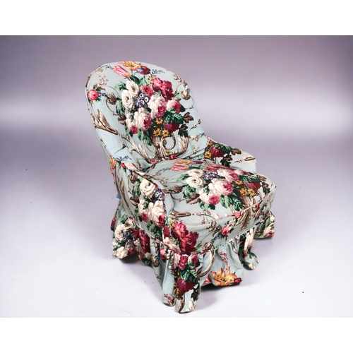 233 - A VICTORIAN 'BOTANICAL' FABRIC ARMCHAIR.
On bent and turned wood feet, with original casters.
Height... 