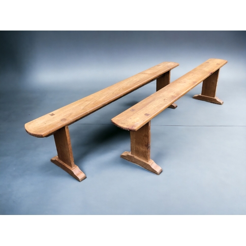 234 - A PAIR OF FRENCH FARMHOUSE FRUITWOOD BENCHES.
Length - 180cm
Height - 45.5cm