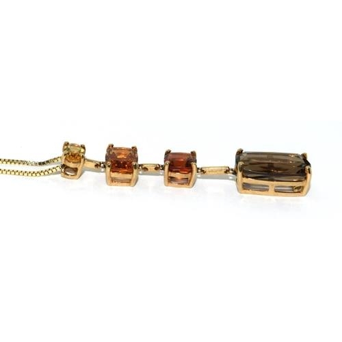 426 - An elegant 9ct gold pendant necklace of semi precious stones in pleasing autumnal colours together w... 