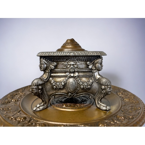 286 - A 19th CENTURY GRAND TOUR INKWELL.
Copper tray with stylised foliate & mask design, with metal trian... 