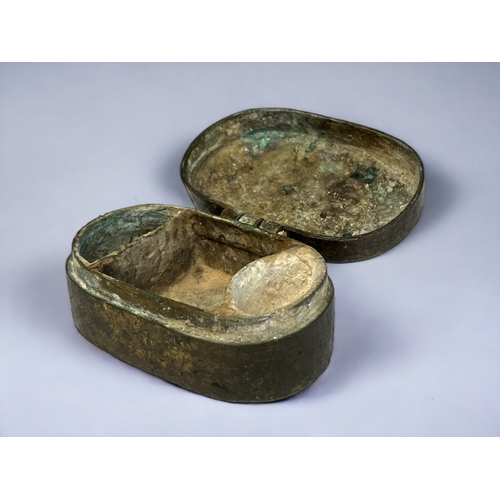 88 - A BRONZE BETEL NUT BOX.
South Asian, 18th century. 
With nut, leaf & lime compartments. Hinged lid. ... 