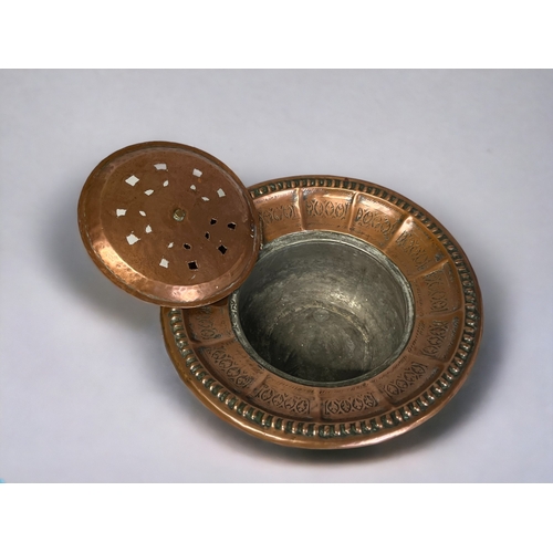 182 - A PERSIAN TINNED COPPER WASH BASIN.
18th / 19th century.
Known in Urdu as a Salfachi, with hinged li... 