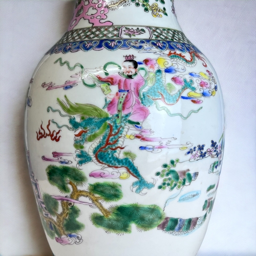 98 - A Large Chinese Porcelain Vase.
Elaborately hand painted overglaze enamels.
Six-character reign mark... 