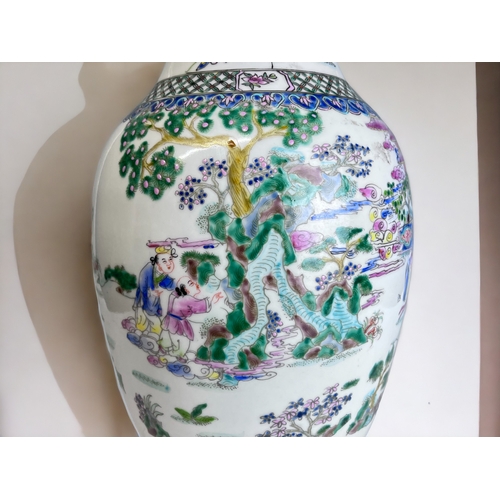 98 - A Large Chinese Porcelain Vase.
Elaborately hand painted overglaze enamels.
Six-character reign mark... 