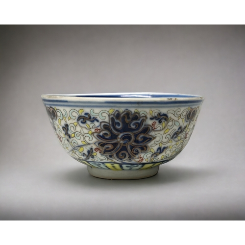 102 - A Chinese Doucai porcelain 'Lotus' bowl.
Guangxu mark and period.
Painted Lotus and scroll pattern. ... 