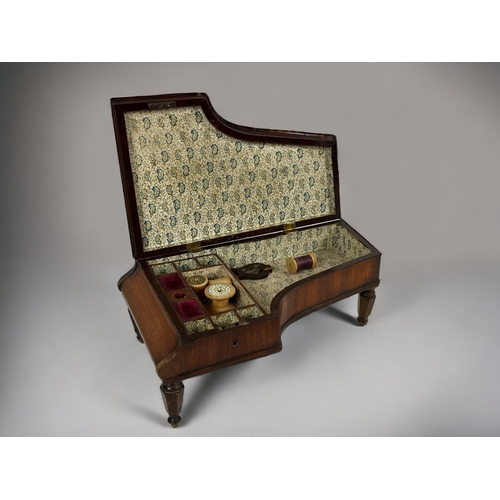 263 - A 19th Century French 'Grand Piano' sewing box.
Modelled as a Grand piano, with bone keys. Lift lid ... 