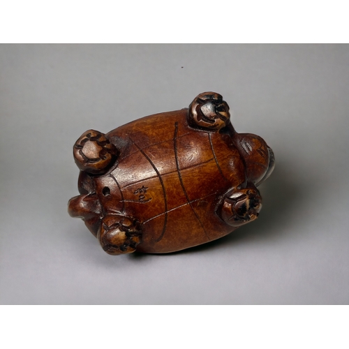 92 - Two carved Japanese Netsuke's.
20th century.
One Phoenix, signed to base. Together with a Dragon-tur... 