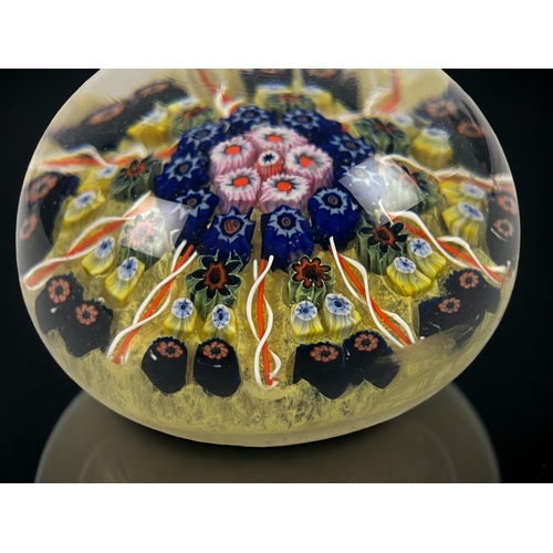 380 - A large vintage Millefiori glass paperweight.
5.5 x 8cm