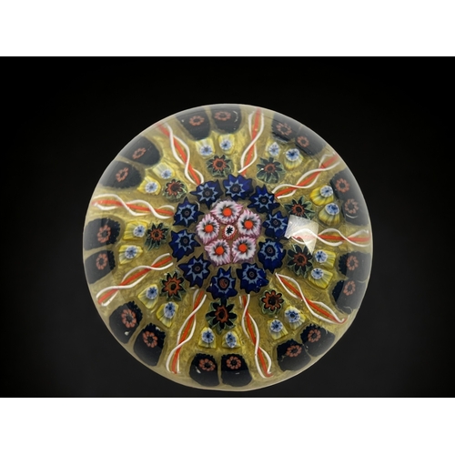 380 - A large vintage Millefiori glass paperweight.
5.5 x 8cm