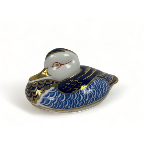 407 - Two Royal Crown Derby paperweights.
Including a Duck and a mouse.