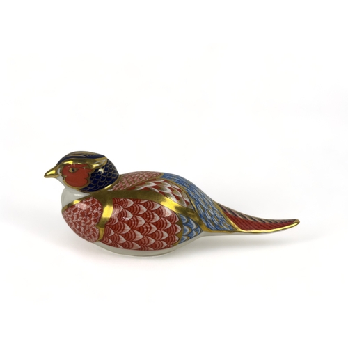 408 - Two Royal Crown Derby paperweights.
Including a Pheasant & penguin.