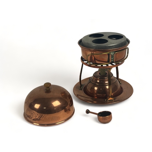 227 - An Arts & Crafts copper Egg coddler.
By W.A.S Benson, London.