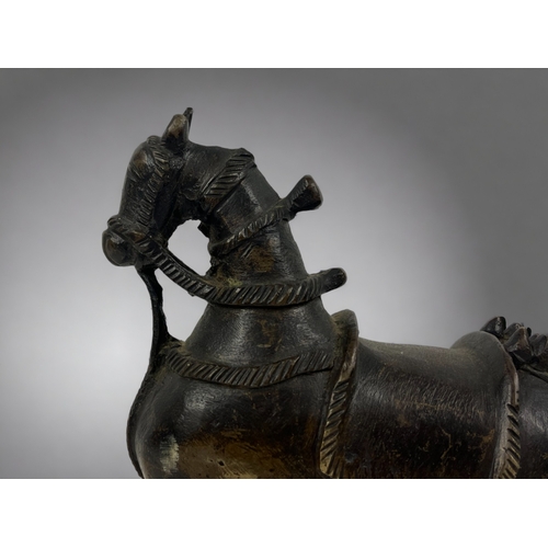 183 - A bronze Horse figure.
India, 19th century.
Height - 23cm