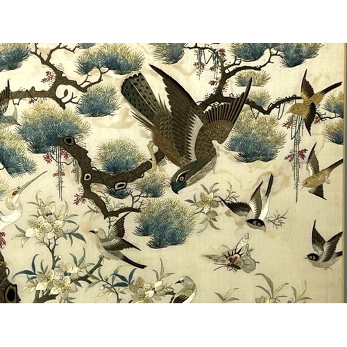 114 - Japanese school, pair of needlework on silk panels. Meiji period. Each finely detailed and elaborate... 